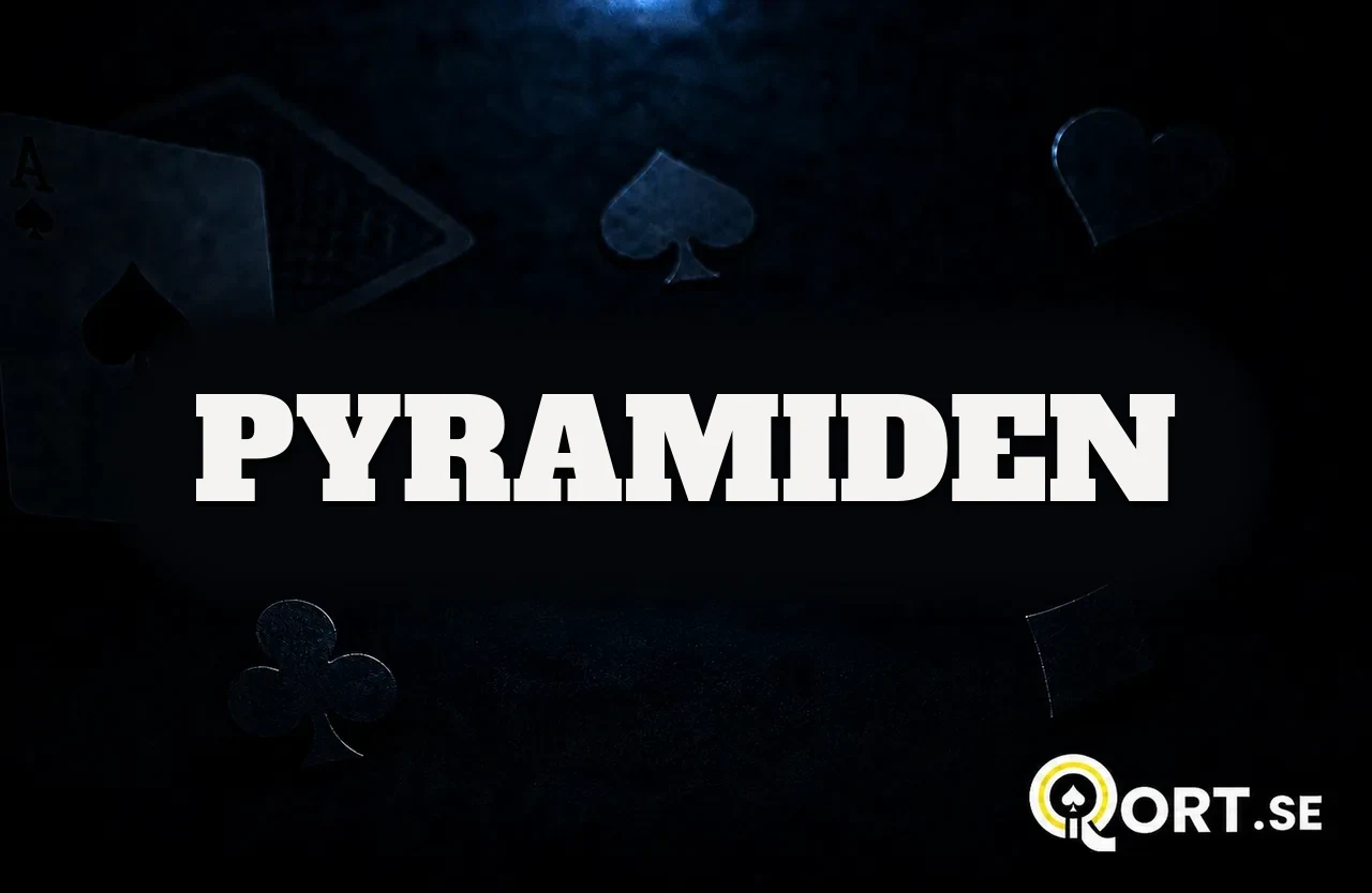 Mörkt kortbord med spelkort och färgsymboler och namnet Pyramiden
